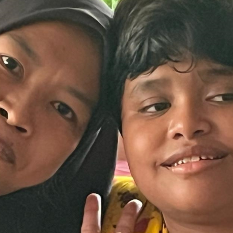 Kind met begeleidster